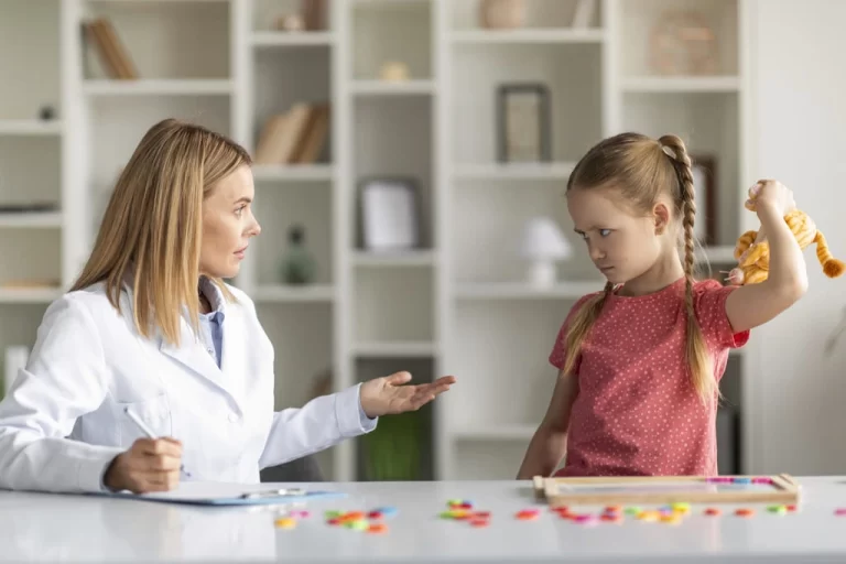 a girl giving mean look to a caregiver