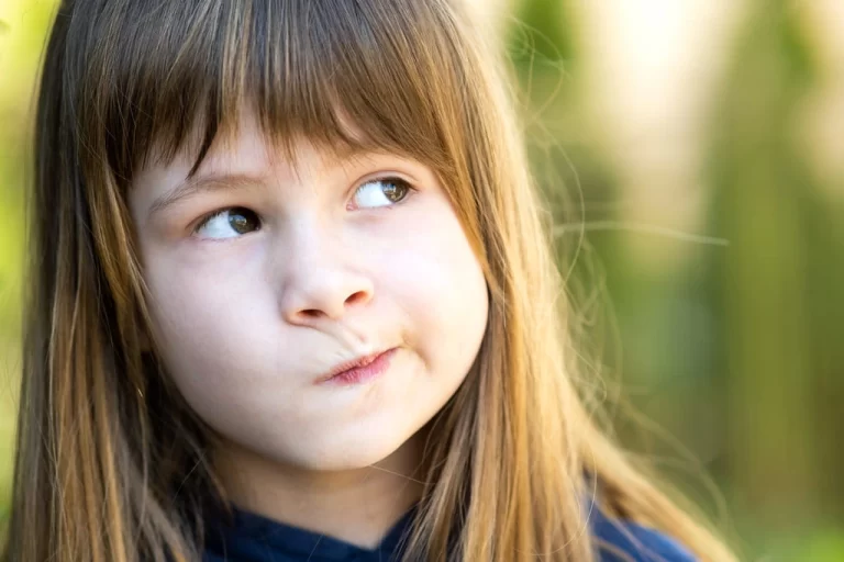 a girl making curious face