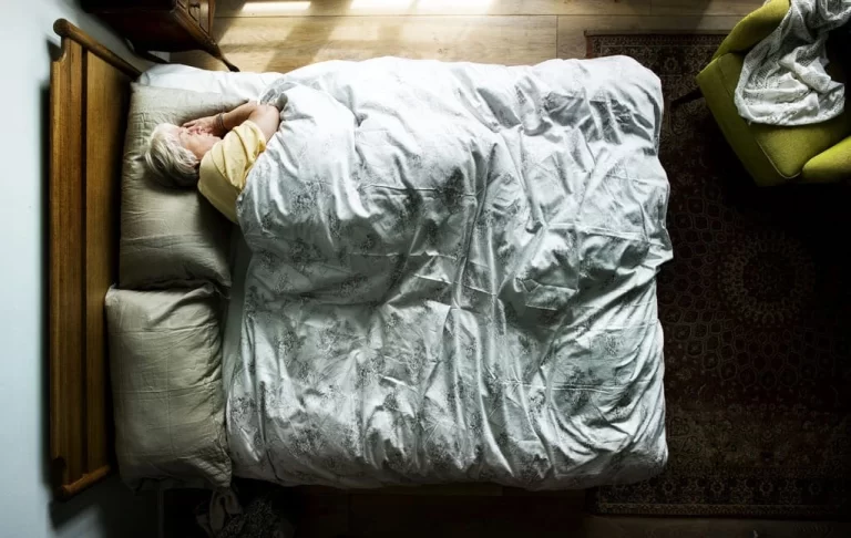 old lady sleeping in bed