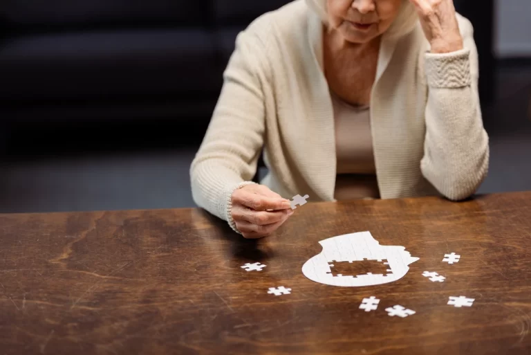 old lady solving a puzzle