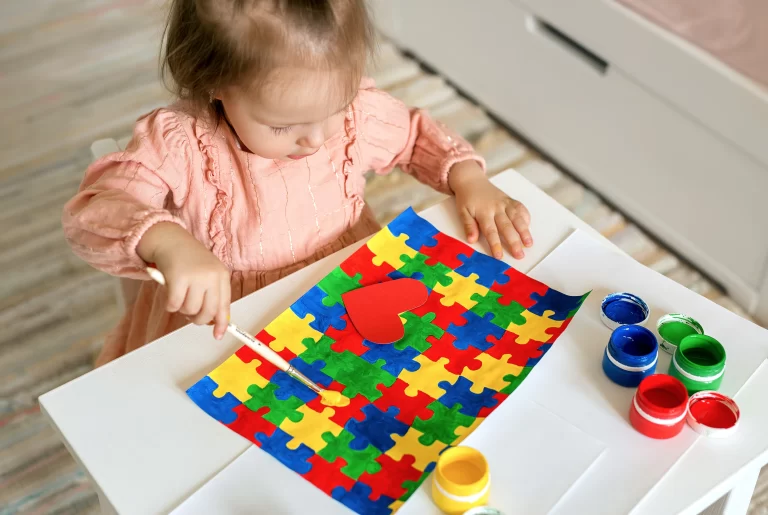 little girl playing puzzle