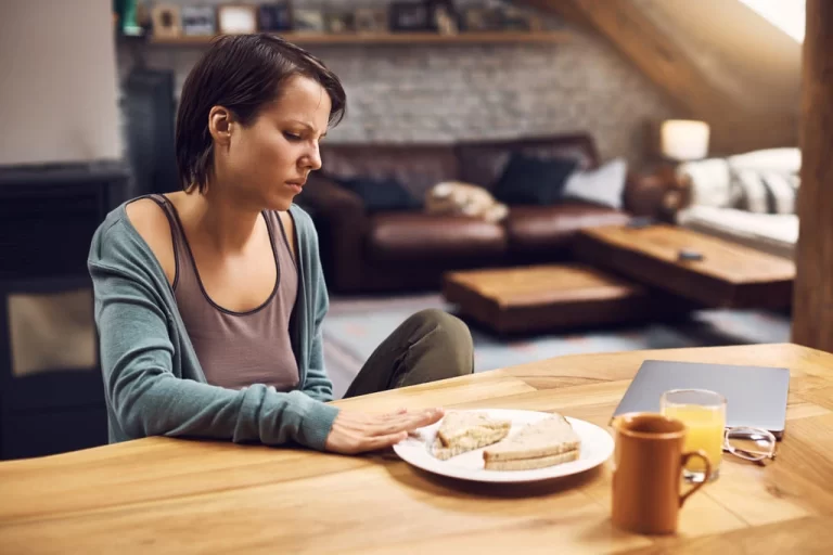 woman refusing to eat breakfast