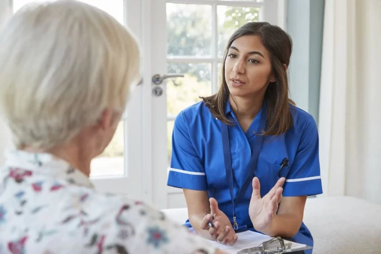 nurse talking to an elderly lady