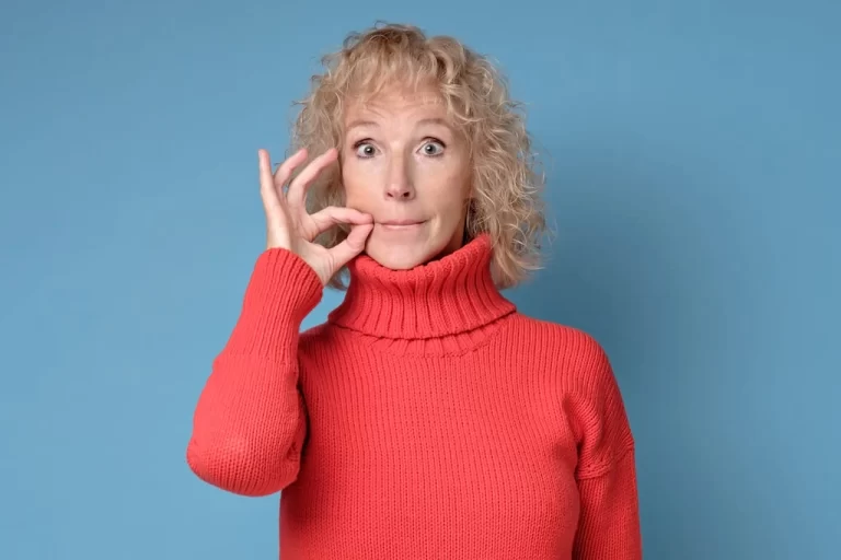 woman "zipping" her mouth