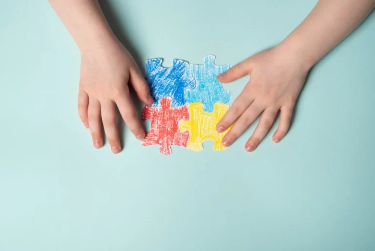 picture of hands solving a puzzle