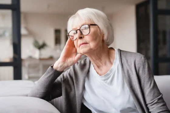 old woman thinking of something