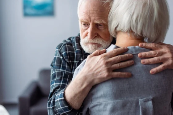 embrace of an elder couple