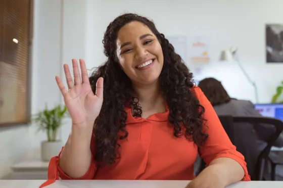 makaton specialist waving and smiling