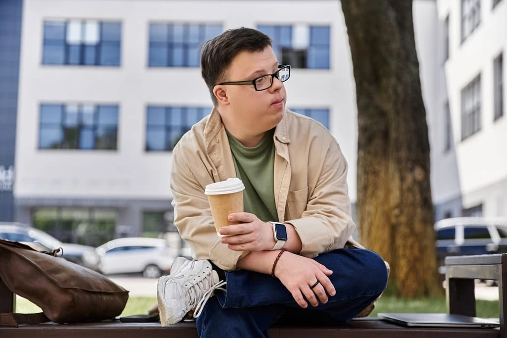 neurodivergent person with a coffee mug